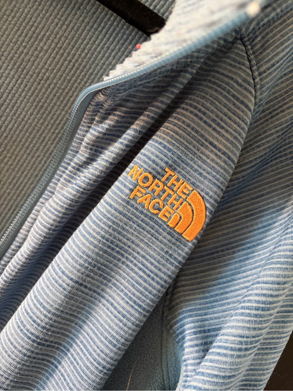 The North Face Blue Ribbed Fleece Jacket with coral Trim